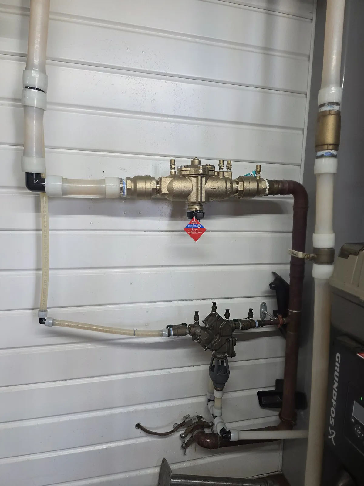 Backflow preventer assembly installed on a copper line in East Texas