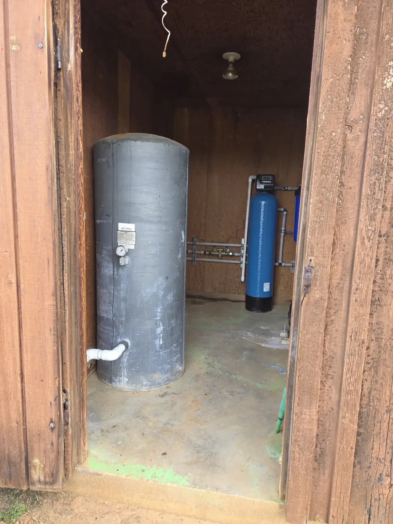Water heater and whole-house filtration installed in a utility building in East Texas
