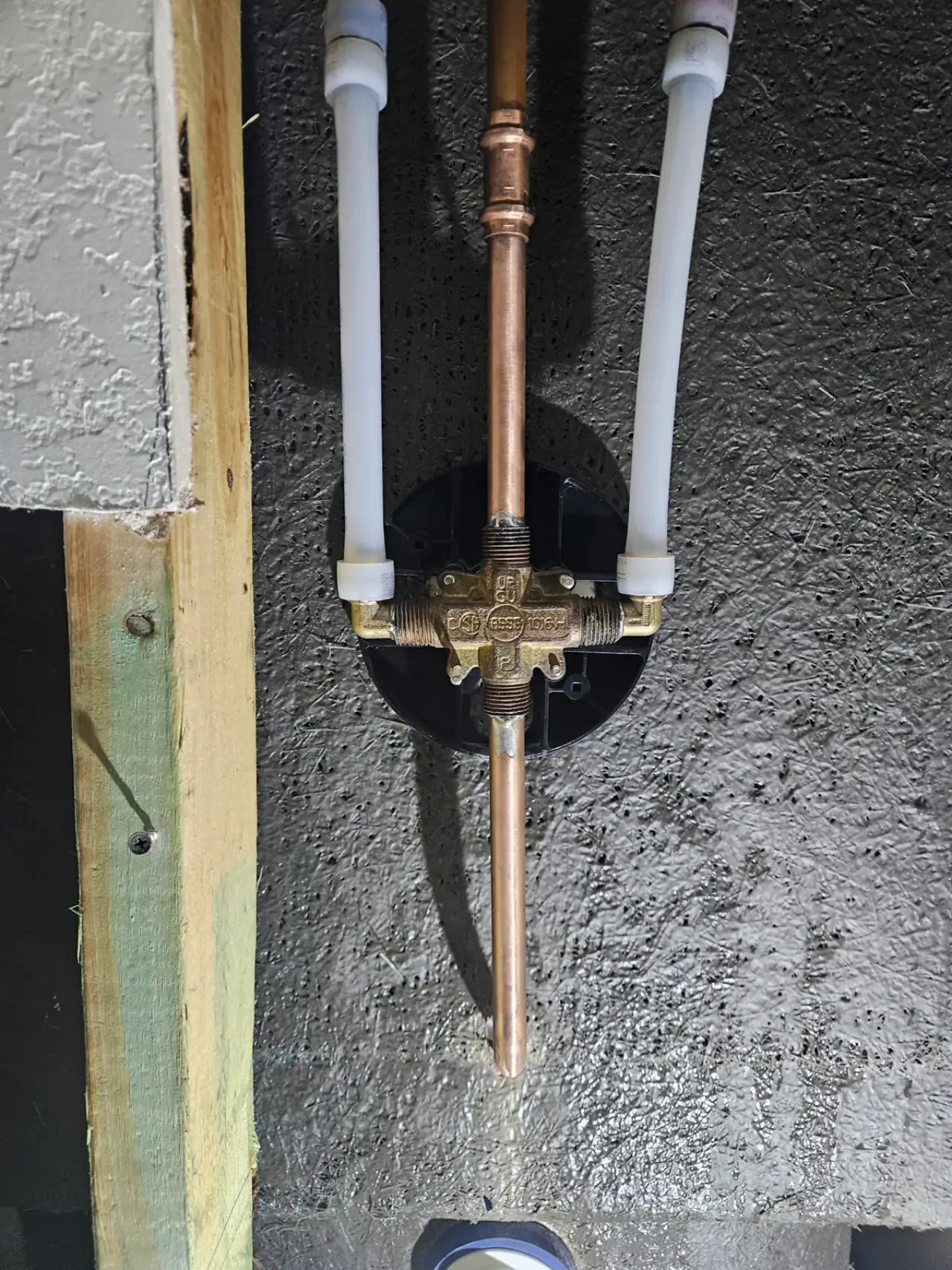 New shower valve body roughed in with PEX supply lines in East Texas