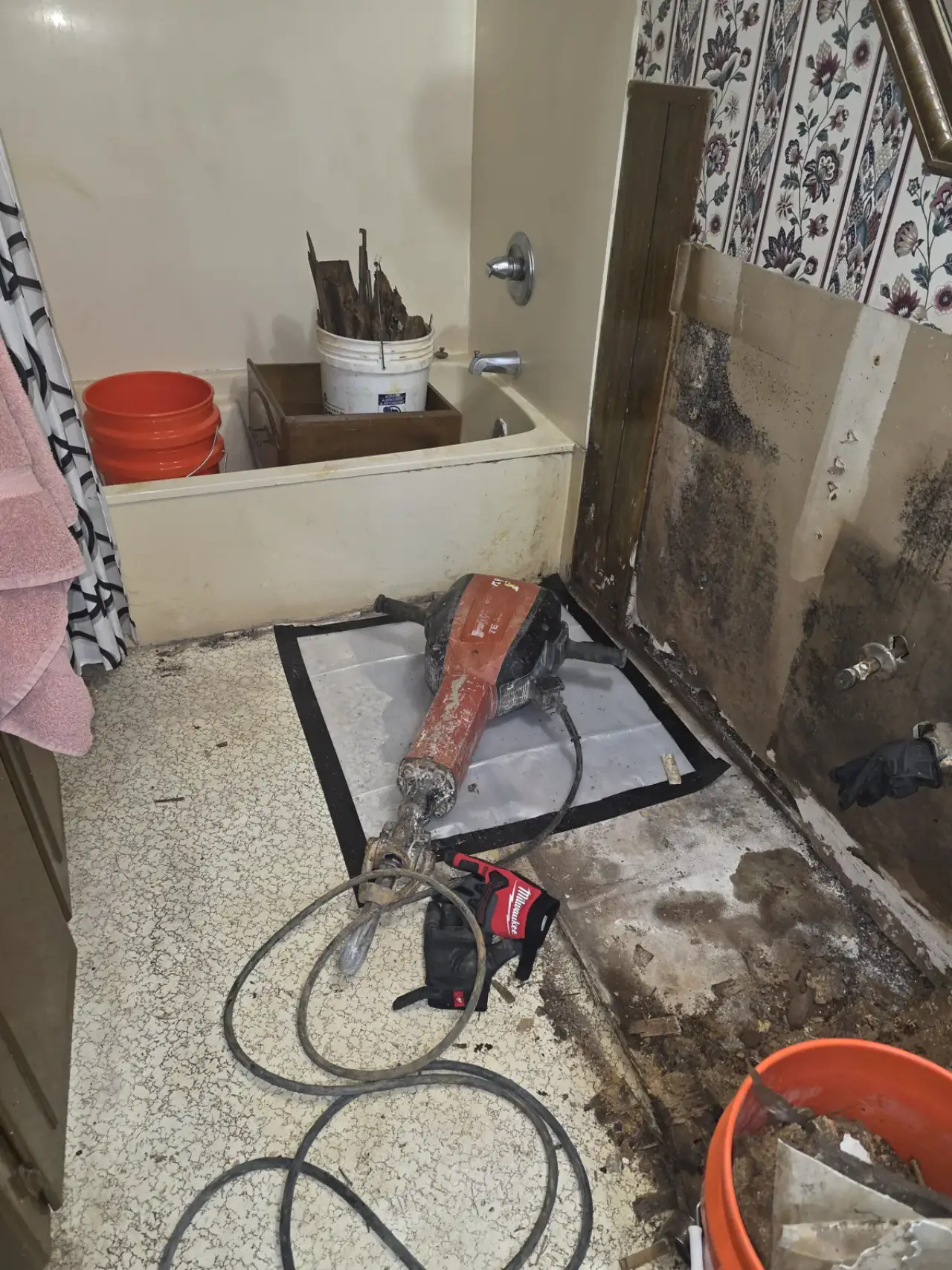 Slab opened for under-slab leak repair in an East Texas bathroom